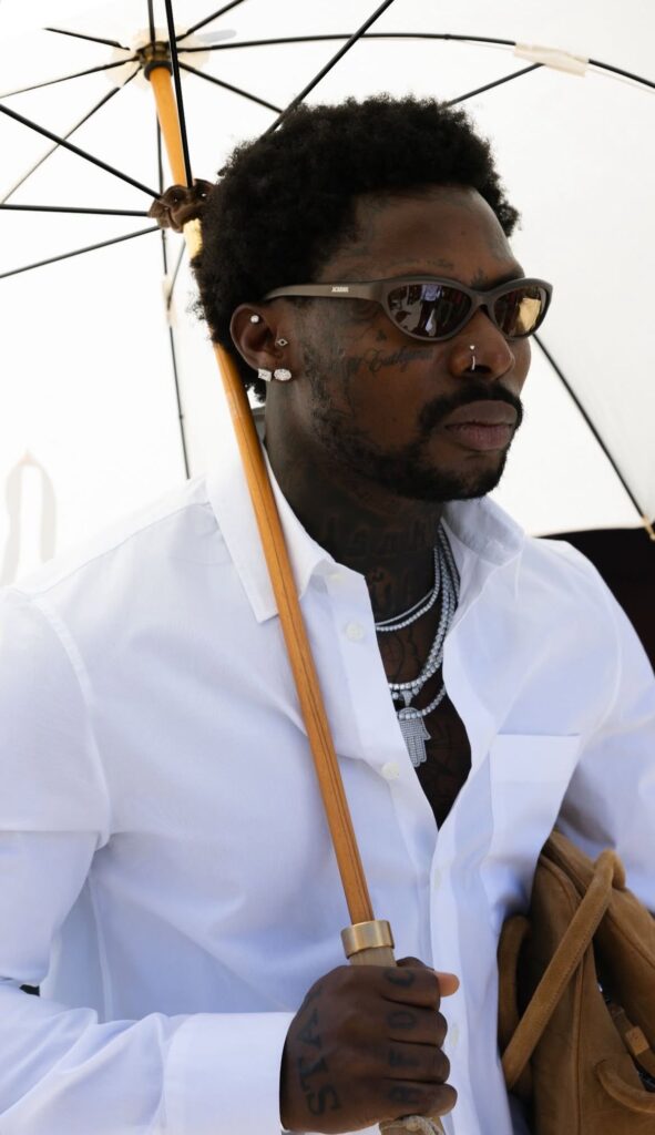 Asake at Jacquemus SS26 Show during Paris Fashion Week.